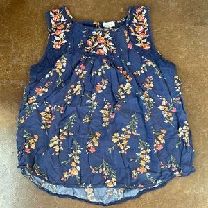 Blue sleeveless blouse